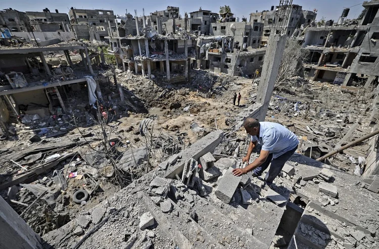 Destruição em Gaza após ataque de Israel  (MAHMUD HAMS/AFP)