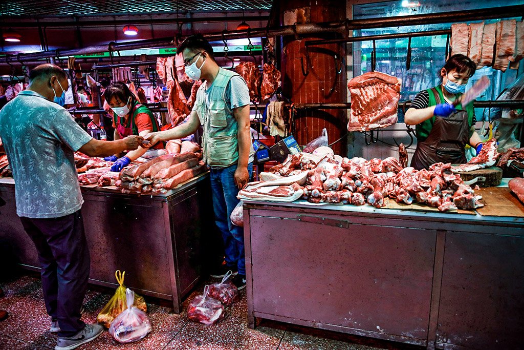 China vai aumentar reservas de carne suína para monitorar preços