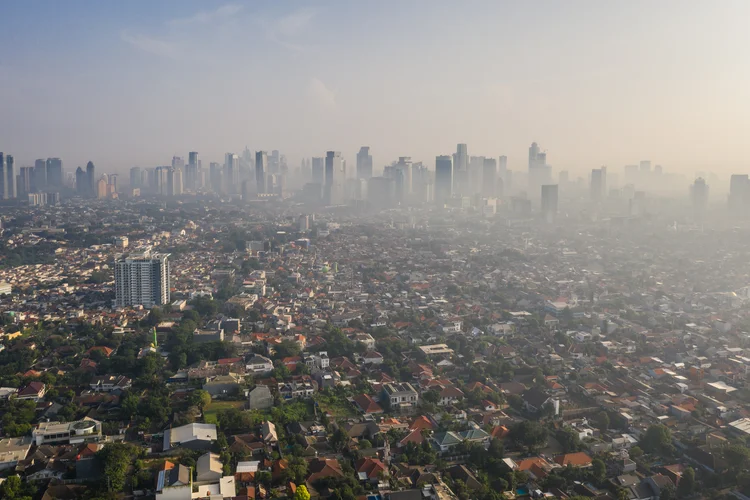 Aerial panorama of the Jakarta skyline with low rise residential district of Kemang contrasting with the business and financial district in the background in Indonesia capital city (Didier Marti/Getty Images)