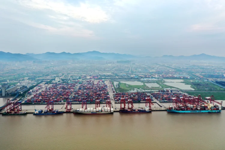 ZHOUSHAN, CHINA - JULY 27: Aerial view of container ships sitting parked at Ningbo-Zhoushan Port at night on July 27, 2020 in Zhoushan, Zhejiang Province of China. (Photo by /VCG via Getty Images) (Yao Feng/Getty Images)