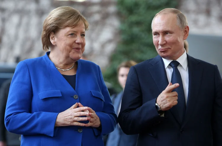 Merkel e Putin: líderes nacionais devem se encontrar pela última vez como chefes de Estado (Adam Berry/Getty Images)