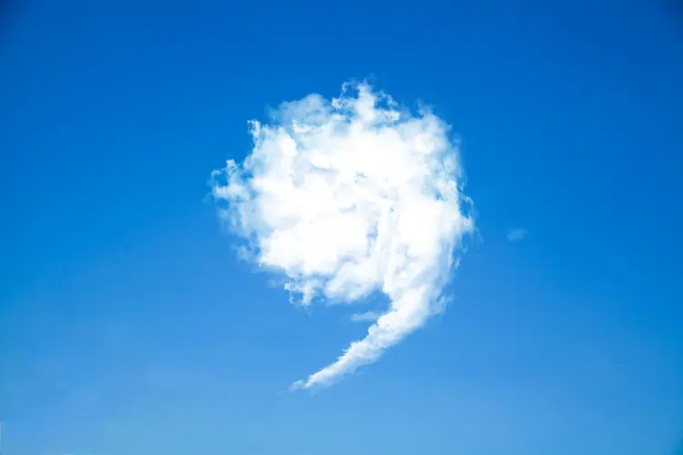 Cloud Creative White Cloud and Comma isolated from Sky Background - 3D illustration of symbols (SUNG YOON JO/Getty Images)