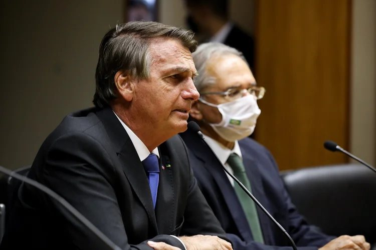 Bolsonaro e Guedes: presidente e ministro da Economia pediram o apoio de empresários do setor de supermercados para controlar o aumento de preços (Clauber Cleber Caetano/PR/Flickr)