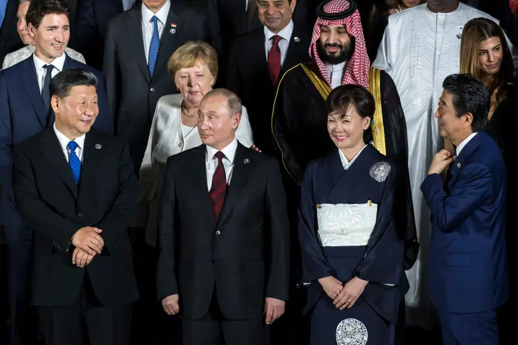 Xi Jinping, Angela Merkel, Vladimir Putin e outros líderes no último G20 presencial, em 2019, no Japão: presidente chinês não deve comparecer neste ano (Tomohiro Ohsumi/Getty Images)