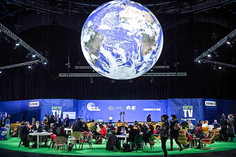 Após duas semanas de negociações, a COP26 deveria terminar oficialmente nesta sexta-feira (OLI SCARFF/AFP/Getty Images)