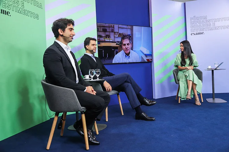 Gabriel Muricca Galípolo, Luis Henrique Guimarães e  Marco Cauduro  discutem infraestrutra em fórum da Exame (Leandro Fonseca/Exame)