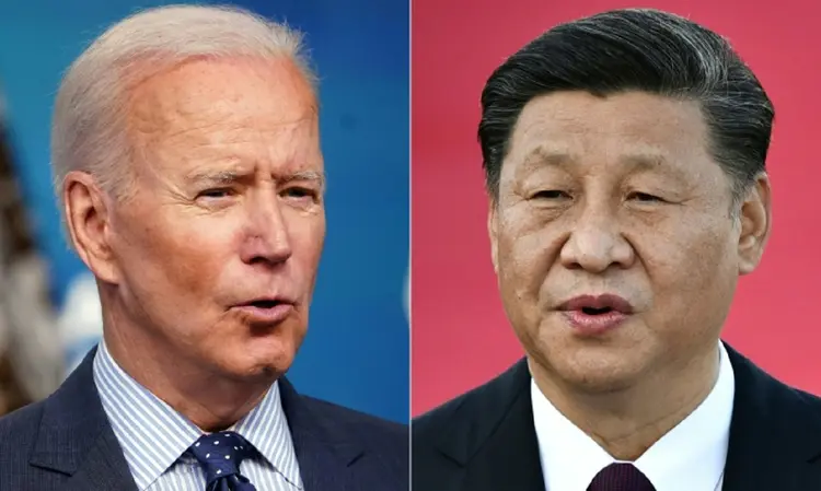 Os presidentes dos EUA, Joe Biden (E), e da China, Xi Jinping (D). (AFP/AFP)