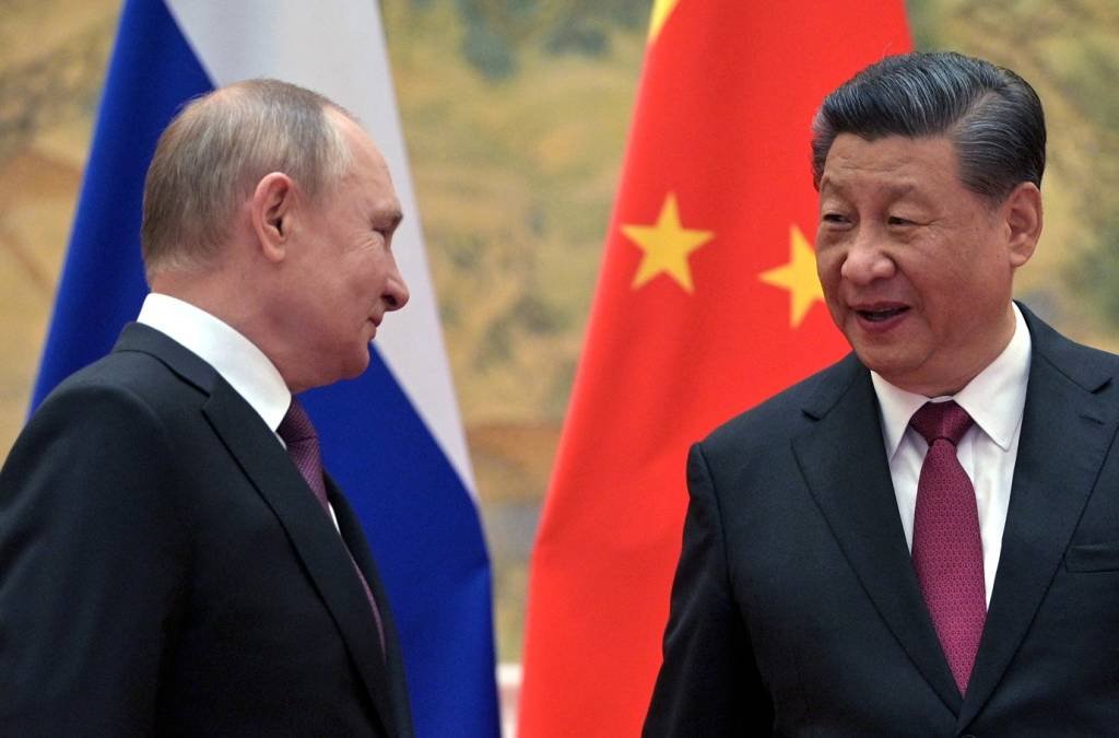 Putin e Xi Jinping: por telefone, presidente chinês garantiu (Sputnik/Aleksey Druzhinin/Kremlin/Reuters)