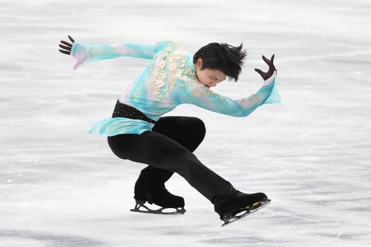 Bicampeão olímpico no individual masculino, Hanyu chegou a Pequim como grande favorito à medalha de ouro. (Atsushi Tomura/Getty Images)