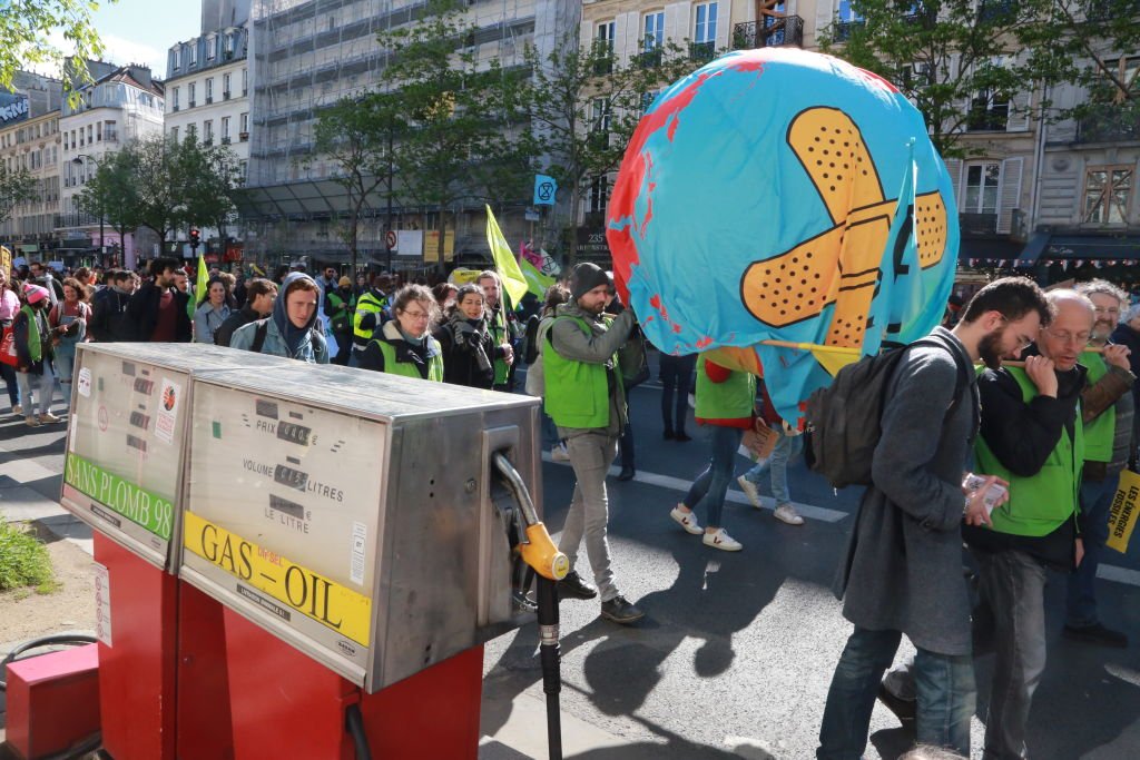 Protestors Rally In Paris On Eve Of Presidential Elections