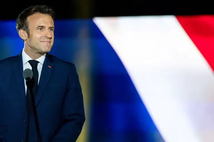 Emmanuel Macron é reeleito presidente da França neste domingo, 24 de abril (Benjamin Girette/Bloomberg/Getty Images)