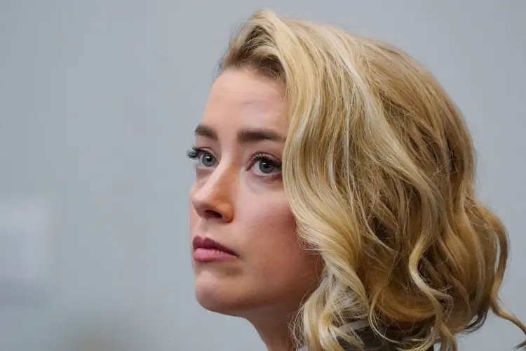 "O que vocês veem neste tribunal é um eco", disse a atriz Amber Heard em último dia de julgamento civil contra Johnny Depp (STEVE HELBER/POOL/AFP/Getty Images)