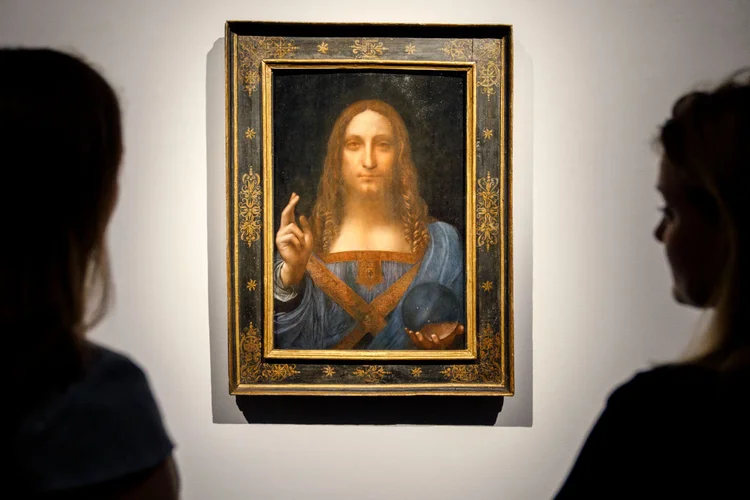 Salvator Mundi, por Leonardo da Vinci. A obra de arte mais cara já vendida (TOLGA AKMEN/AFP/Getty Images)