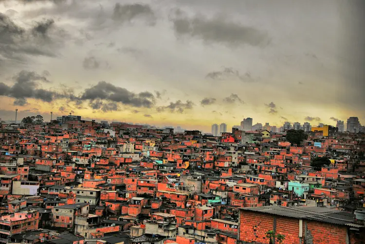 This is a photograph of favela Paraisopolis, one of the biggest informal settlements in Sao Paulo (Brazil). The favela is at least 50 years old and the shacks have been upgraded along the years through self-help. This photograph is taken from a vantage point in the north of the favela, close to Giovanni Gronchi Avenue. It was taken in October 2011. (Roberto Rocco r.c.rocco@tudelft.nl/Getty Images)