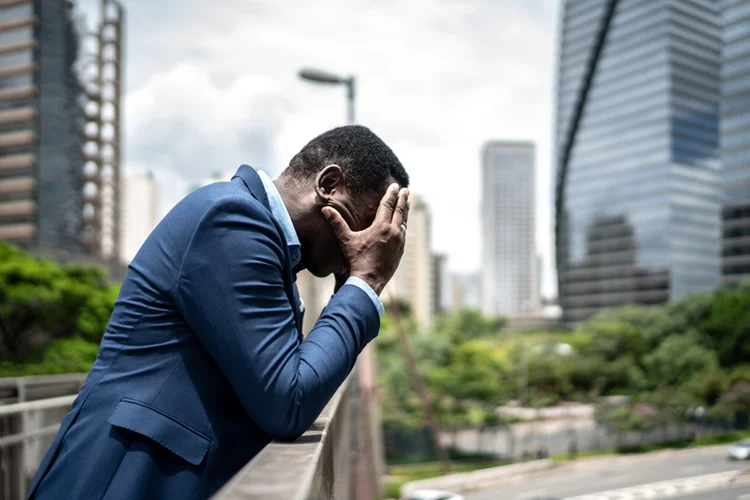 Worried / Hopelessness mature businessman at bridge (FG Trade/Getty Images)