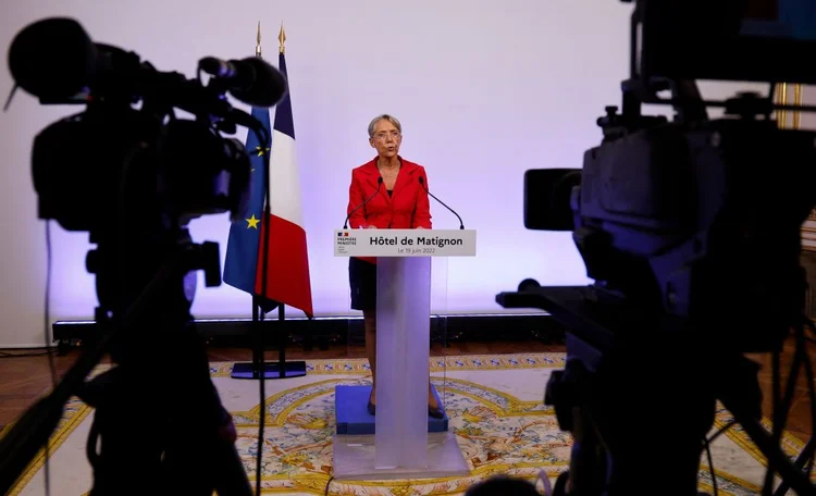 France's Prime Minister Elisabeth Borne gives a speech after the first results of the parliamentary elections at Matignon in Paris on June 19, 2022. - French President Emmanuel Macron is set to lose his parliamentary majority after major election gains by a newly formed left-wing alliance and the far right, in a stunning blow to his hopes of major reform in his second term. (Photo by Ludovic MARIN / POOL / AFP) (Photo by LUDOVIC MARIN/POOL/AFP via Getty Images) (LUDOVIC MARIN/POOL/AFP/Getty Images)