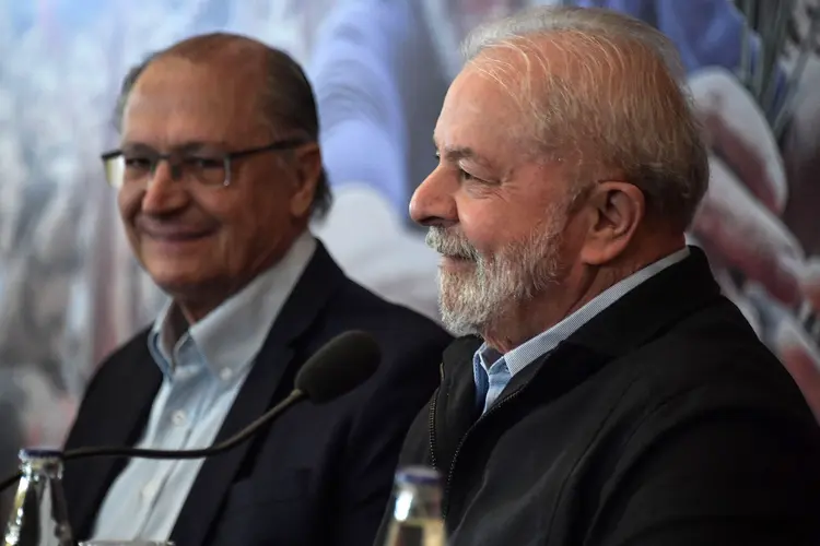 Former President (2003-2010) Luiz Inacio Lula da Silva (R) and former Sao Paulo's Governor (2001-2006 and 2011-2018) Geraldo Alckmin (L) attend the launch of their government program guidelines, with representatives of political parties that support their presidential campaign for the October elections, in Sao Paulo, Brazil, on June 21, 2022. (Photo by NELSON ALMEIDA / AFP) (Photo by NELSON ALMEIDA/AFP via Getty Images) (NELSON ALMEIDA / AFP/Getty Images)