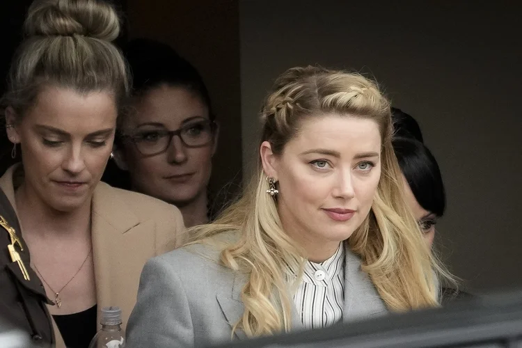 FAIRFAX, VA - MAY 27: Actress Amber Heard departs the Fairfax County Courthouse on May 27, 2022 in Fairfax, Virginia. Closing arguments in the Depp v. Heard defamation trial, brought by Johnny Depp against his ex-wife Amber Heard, concluded today and jury deliberations begin. (Photo by /Getty Images) (Drew Angerer/Getty Images)