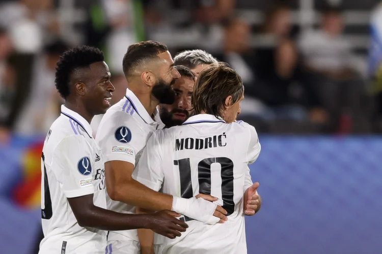 HELSINKI, FINLAND - AUGUST 10: Karim Benzema of Real Madrid celebrates after scoring his team's second goal with teammates during the Real Madrid CF and Eintracht Frankfurt - UEFA Super Cup Final 2022 at on August 10, 2022 in Helsinki, Finland. (Photo by Gaston Szerman/DeFodi Images via Getty Images) (DeFodi/Getty Images)