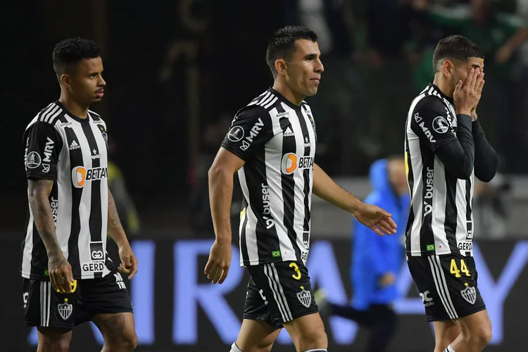 Atletico Mineiro's players react after loosing in the penalty shoot out against Palmeiras at the end of their Copa Libertadores football tournament quarterfinals all-Brazilian second leg match at the Alianza Parque stadium in Sao Paulo, Brazil, on August 10, 2022. (Photo by NELSON ALMEIDA / AFP) (Photo by NELSON ALMEIDA/AFP via Getty Images) (NELSON ALMEIDA/Getty Images)