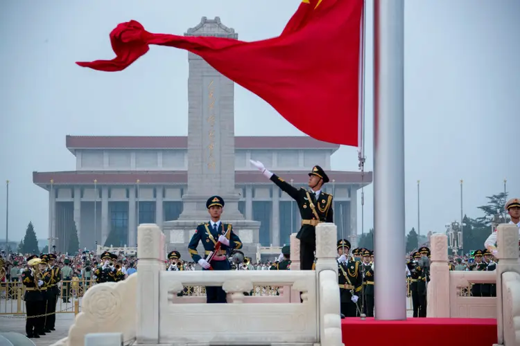 BEIJING, CHINA - AUGUST 01: The Guard of Honor of the Chinese People's Liberation Army (PLA) performs a flag-raising ceremony at Tian'anmen Square on China's Army Day on August 1, 2022 in Beijing, China. (Photo by VCG/VCG via Getty Images) (VCG/VCG/Getty Images)