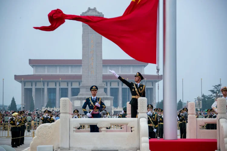 BEIJING, CHINA - AUGUST 01: The Guard of Honor of the Chinese People's Liberation Army (PLA) performs a flag-raising ceremony at Tian'anmen Square on China's Army Day on August 1, 2022 in Beijing, China. (Photo by VCG/VCG via Getty Images) (VCG/VCG/Getty Images)