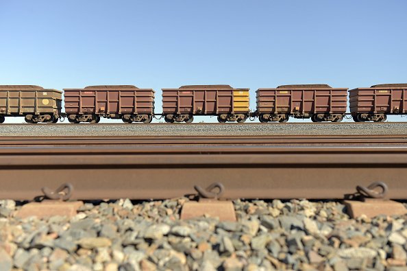 A freight train carrying iron ore travels along a track near a Rio Tinto Group rail yard in Karratha, Western Australia, Australia, on Wednesday, June 22, 2022. Iron ore is on course to end the week lower, with the increase in Chinese steel plants being idled and swelling inventories seen as signs of stagnant demand. Photographer: Carla Gottgens/Bloomberg via Getty Images (Carla Gottgens/Bloomberg via/Getty Images)