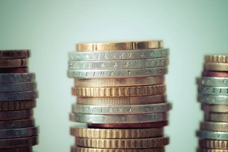 Coins stacked on each other, close up picture, market crisis and financial aid concept (Getty/Getty Images)