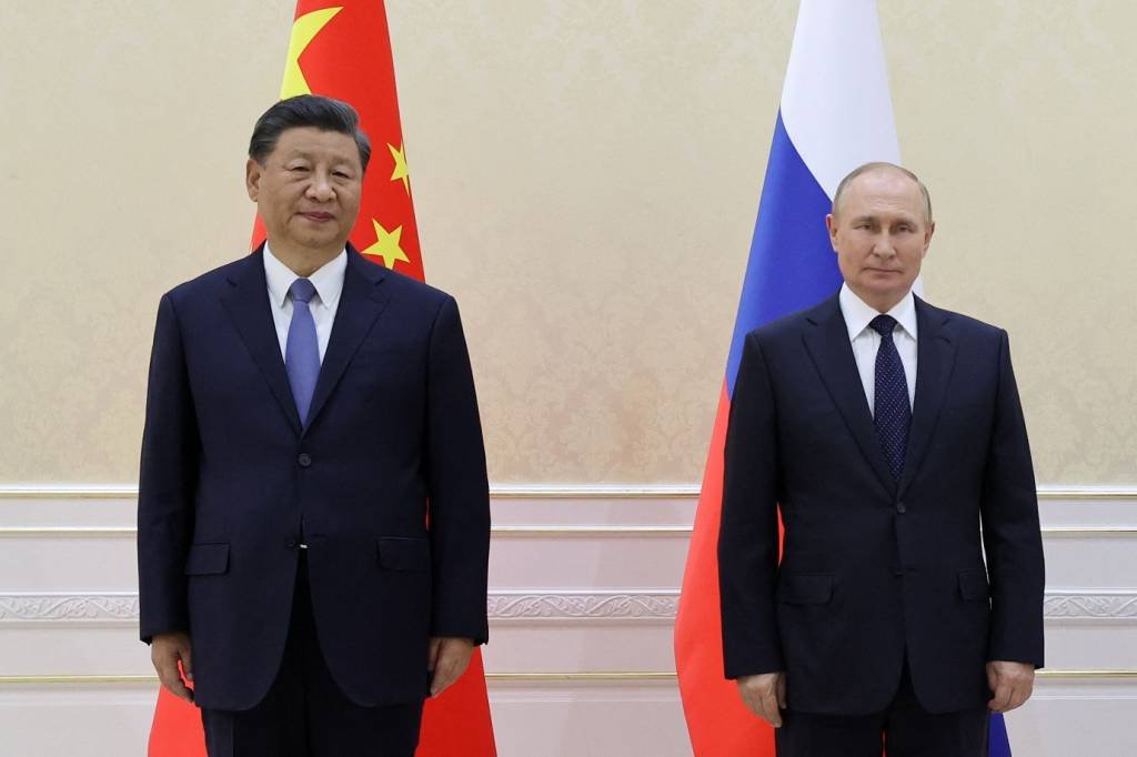 Xi Jinping e Putin (foto de arquivo): primeira visita de Xi desde o início da guerra (Alexandr Demyanchuk / SPUTNIK / AFP/Getty Images)