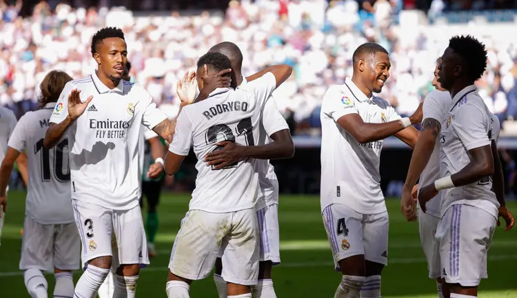 MADRID, SPAIN - SEPTEMBER 03: Rodrygo Goes player of Real Madrid celebrates his goal with teammates Eder Militao, Ferland Mendy, David Alaba, Federico Valverde and Vinicius Jr. during the LaLiga Santander match between Real Madrid CF and Real Betis at Estadio Santiago Bernabeu on September 03, 2022 in Madrid, Spain. (Photo by Antonio Villalba/Real Madrid via Getty Images) (Antonio Villalba/Getty Images)