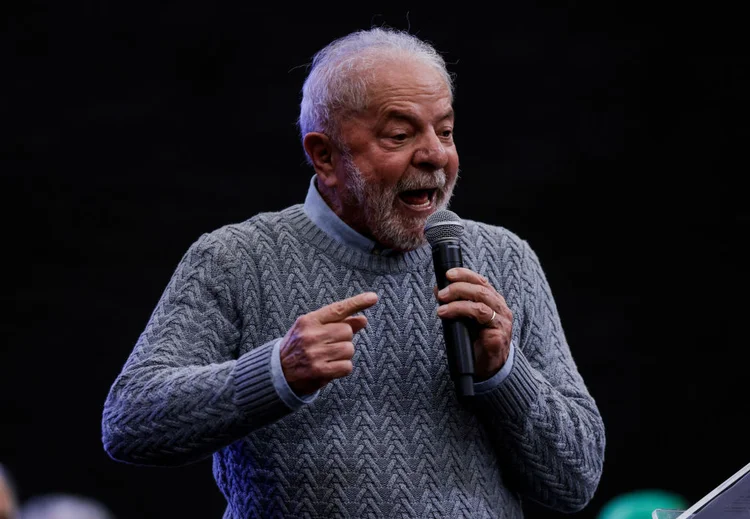 Todos chegaram junto com o presidente, que acenou para a imprensa, ainda dentro do carro (Alexandre Schneider/Getty Images)