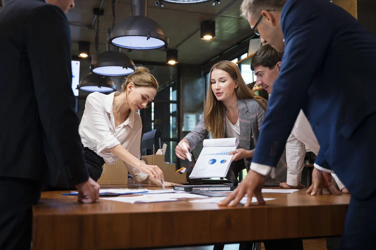 Promoting Women's Empowerment as a Business Strategy Toward Sustainable. A Female Business Development Leader having a project status meeting or decision to report, analyze and improve to increases team's overall productivity in a tech business office. (Nitat Termmee/Getty Images)