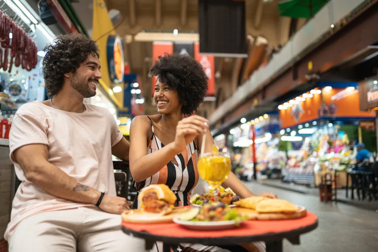 Tourists eating and drinking at São Paulo Municipal Market in Brazil (MesquitaFMS/Getty Images)