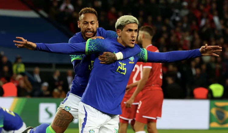 PARIS, FRANCE - SEPTEMBER 27: Pedro #25 of Team Brazil celebrate his first goal with Neymar Jr #10 during the friendly game between Brazil and Tunisia at Parc des Princes on September 27, 2022 in Paris, France. (Photo by Xavier Laine/Getty Images) (Xavier Laine/Getty Images)