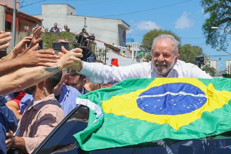 "Hoje nós estamos dizendo ao mundo que o Brasil está de volta", disse Lula na noite deste domingo (Ricardo Stuckert/Divulgação/Divulgação)