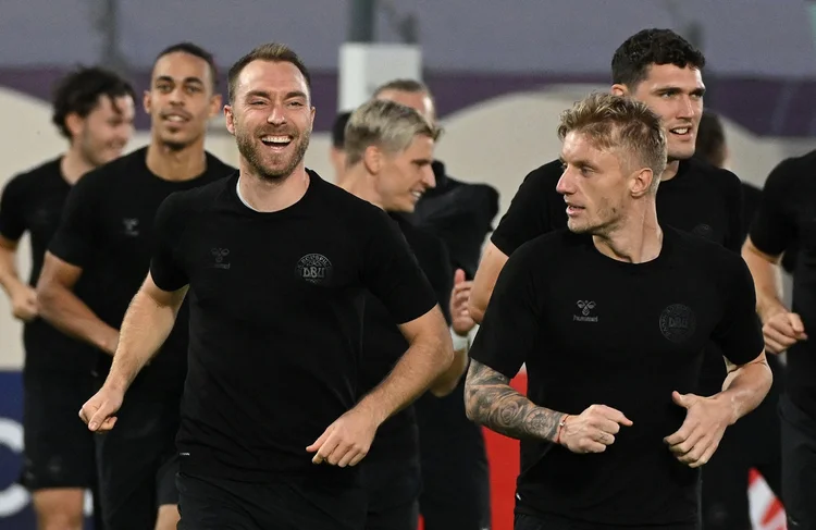 Denmark's midfielder Christian Eriksen (L) and Denmark's defender Daniel Wass (R) take part in a training session at the al Sailiya SC Training Site in Doha on November 21, 2022, on the eve of the Qatar 2022 World Cup football match between Denmark and Tunisia. (Photo by NATALIA KOLESNIKOVA / AFP) (Photo by NATALIA KOLESNIKOVA/AFP via Getty Images) (NATALIA KOLESNIKOVA/AFP/Getty Images)