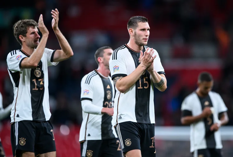 LONDON, ENGLAND - SEPTEMBER 26: Thomas Mueller (L) and Niklas Suele (R) of Germany applaud after the UEFA Nations League League A Group 3 match between England and Germany at Wembley Stadium on September 26, 2022 in London, England. (Photo by Marvin Ibo Guengoer - GES Sportfoto/Getty Images) (Marvin Ibo Guengoer/Getty Images)