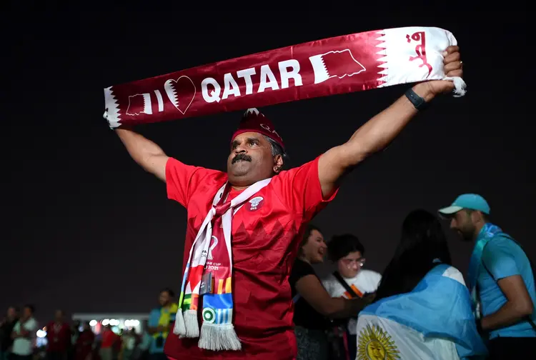 DOHA, QATAR - NOVEMBER 19: A Qatar fan displays a scarf prior to the Fan Festival Official Opening ahead of the FIFA World Cup 2022 Qatar Fan Festival at Al Bidda Park on November 19, 2022 in Doha, Qatar. (Photo by Justin Setterfield/Getty Images ) (Justin Setterfield/Getty Images)