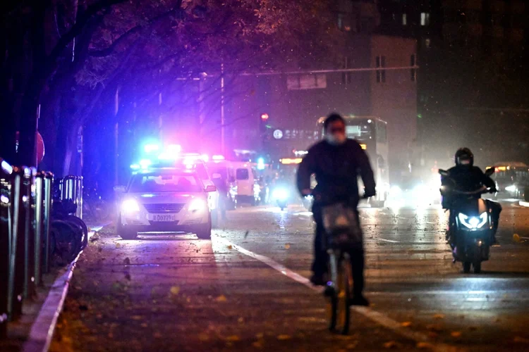 Pequim: Viaturas da polícia na capital chinesa (AFP/AFP Photo)
