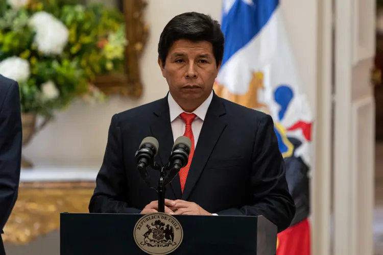 SANTIAGO, CHILE - NOVEMBER 29: Peruvian President Pedro Castillo (pictured) holds a press conference at the La Moneda presidential palace in Santiago, Chile, on November 29, 2022. Boric received this Tuesday at the palace President of La Moneda to his Peruvian counterpart, Pedro Castillo, who is going through one of the biggest political crises in Peru. Despite the approval of the visit to Chile by the Peruvian parliament, the Congress of that same country had denied Castillo's trip to the Summit of the Pacific Alliance, in Mexico City, for which reason he had to suspend said summit. (Photo by Lucas Aguayo Araos/Anadolu Agency via Getty Images) (Lucas Aguayo Araos/Anadolu Agency/Getty Images)