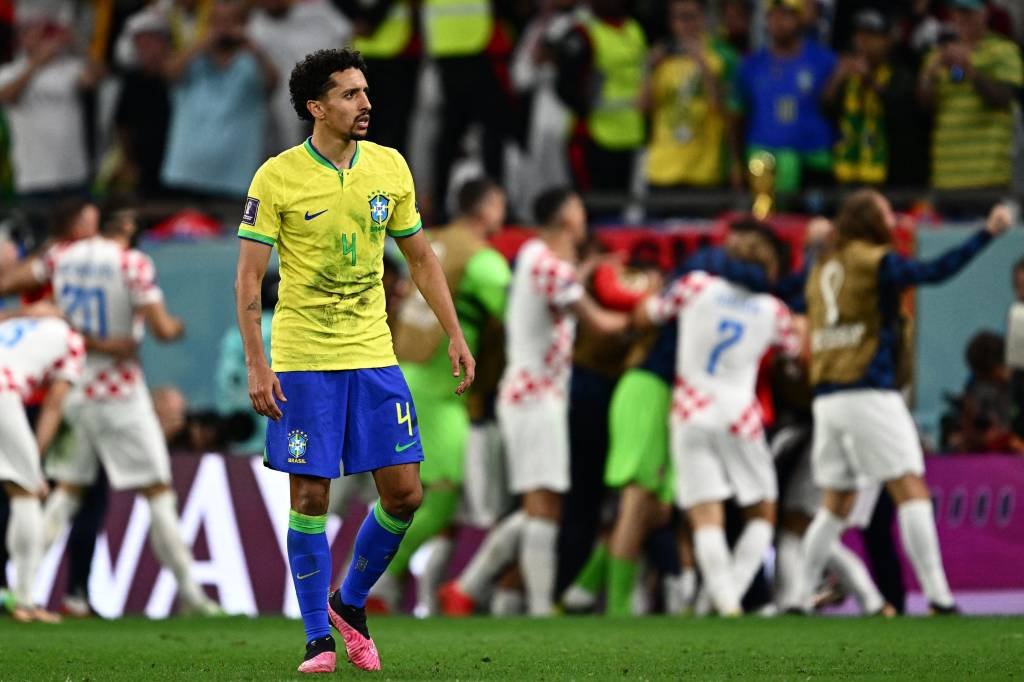 Brazil's defender #04 Marquinhos reacts after Croatia's forward #16 Bruno Petkovic scored his team's first goal during the Qatar 2022 World Cup quarter-final football match between Croatia and Brazil at Education City Stadium in Al-Rayyan, west of Doha, on December 9, 2022. (Photo by GABRIEL BOUYS / AFP) (Photo by GABRIEL BOUYS/AFP via Getty Images) (GABRIEL BOUYS/Getty Images)