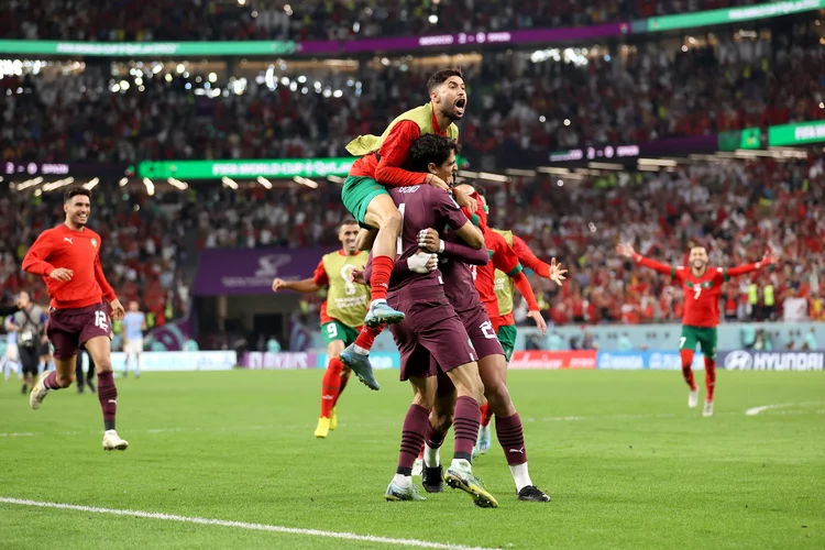 AL RAYYAN, QATAR - DECEMBER 06: Achraf Hakimi of Morocco celebrates after the team's victory in the penalty shoot out during the FIFA World Cup Qatar 2022 Round of 16 match between Morocco and Spain at Education City Stadium on December 06, 2022 in Al Rayyan, Qatar. (Photo by Catherine Ivill/Getty Images) (Catherine Ivill/Getty Images)