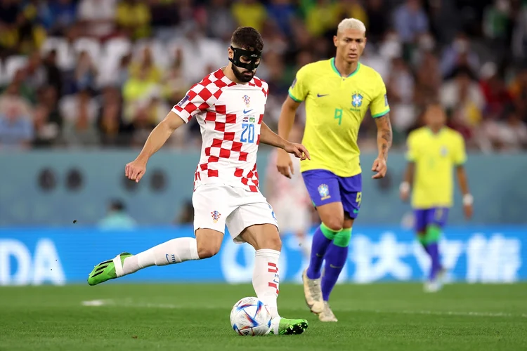 AL RAYYAN, QATAR - DECEMBER 09: Josko Gvardiol of Croatia controls the ball during the FIFA World Cup Qatar 2022 quarter final match between Croatia and Brazil at Education City Stadium on December 09, 2022 in Al Rayyan, Qatar. (Photo by  via Getty Images) (Hector Vivas - FIFA/FIFA/Getty Images)