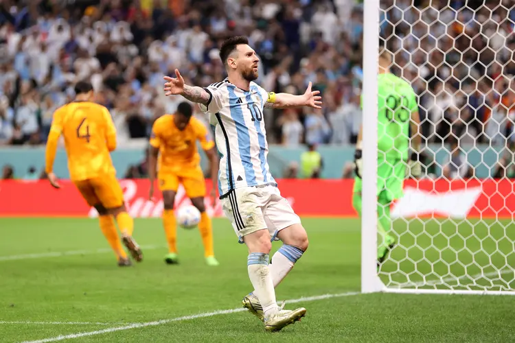 LUSAIL CITY, QATAR - DECEMBER 09: Lionel Messi of Argentina celebrates after scoring the team's second goal via a penalty during the FIFA World Cup Qatar 2022 quarter final match between Netherlands and Argentina at Lusail Stadium on December 09, 2022 in Lusail City, Qatar. (Photo by Clive Brunskill/Getty Images) (Clive Brunskill/Getty Images)