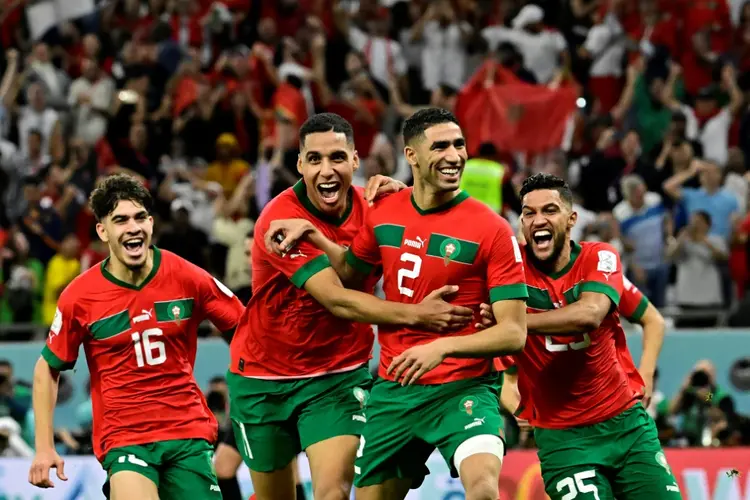 Marrocos: Seleção comemora a vitória sobre a Espanha nos pênaltis (3-0) nas oitavas de final (AFP/AFP Photo)