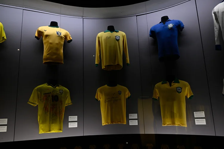 A jersey (Top-C) of the Brazil football team signed by late Brazilian football legend Pele is displayed at the Museu Selecao Brasileira located inside the Brazil Football Confederation (CBF) headquarters in Rio de Janeiro, Brazil, on December 30, 2022. - Brazil started three days of national mourning on Friday for football legend Pele, the three-time World Cup winner widely regarded as the greatest player of all time, who has died at the age of 82. (Photo by MAURO PIMENTEL / AFP) (Photo by MAURO PIMENTEL/AFP via Getty Images) (Mauro Pimentel/Getty Images)