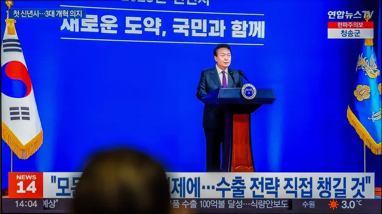 SEOUL, SOUTH KOREA - 2023/01/01: A TV screen shows footage of South Korean President Yoon Suk Yeol's New Year's address during a news program at the Yongsan Railway Station in Seoul. President Yoon Suk Yeol vowed on January 1, 2023, to push reforms in labor, education, and pensions, saying they cannot be delayed any longer and the country's future depends on it.
In a New Year's address live from his office, Yoon outlined his administration's plans to tackle economic challenges, such as by changing the country's export strategy and investing in future strategic technologies.
President Yoon Suk Yeol ordered military commanders on January 1, 2023, to punish any North Korean provocations without fail with a "firm determination not to avoid going to war," an official said.
Yoon made the call in virtual talks with Joint Chiefs of Staff Chairman Gen. Kim Seung-kyum and other commanders, as the North's state media reported that North Korean leader Kim Jong-un has called for an "exponential" increase in the country's nuclear arsenal while naming the South "our undoubted enemy.". (Photo by Kim Jae-Hwan/SOPA Images/LightRocket via Getty Images) (Kim Jae-Hwan/Getty Images)