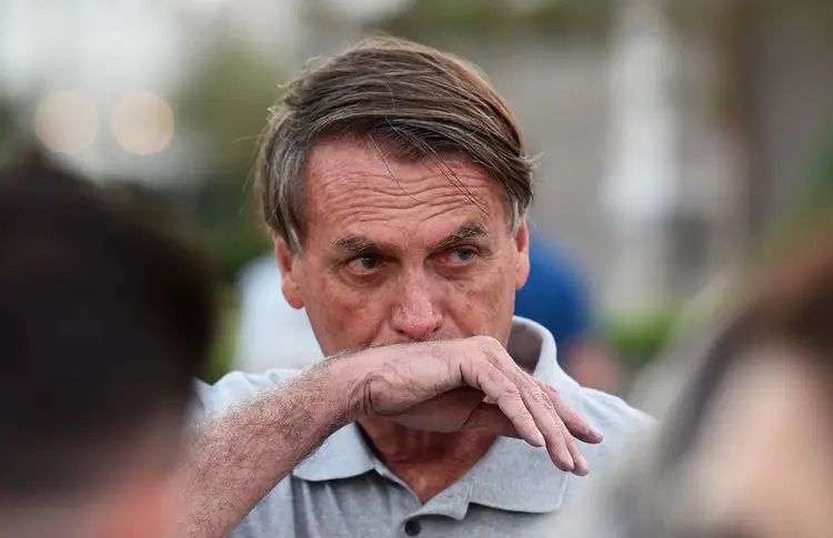 Bolsonaro: a Procuradoria pediu a execução de três multas aplicadas a ele por descumprimento de medidas (Paul Hennessy/Anadolu Agency/Getty Images)