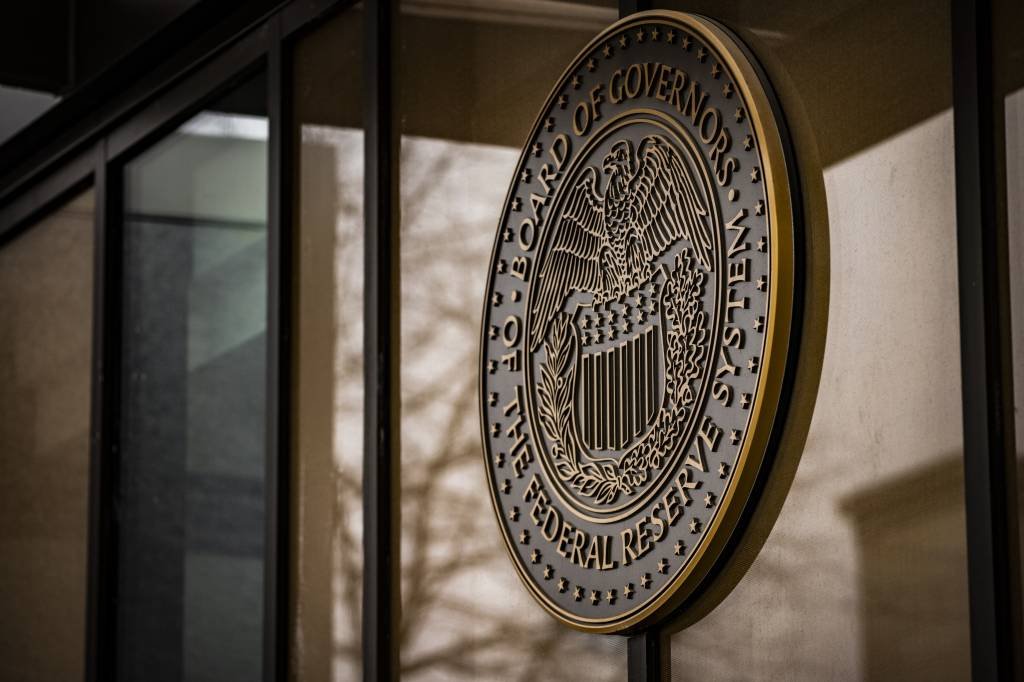 The seal of the US Federal Reserve Board of Governors at the William McChesney Martin Jr. Federal Reserve building  in Washington, DC, US, on Sunday, Jan. 29, 2023. The Federal Reserve chair, who last week tested positive for Covid-19, still plans to hold an in-person press conference following a meeting of the rate-setting Federal Open Market Committee. Photographer: Samuel Corum/Bloomberg via Getty Images (Samuel Corum / Bloomberg/Getty Images)