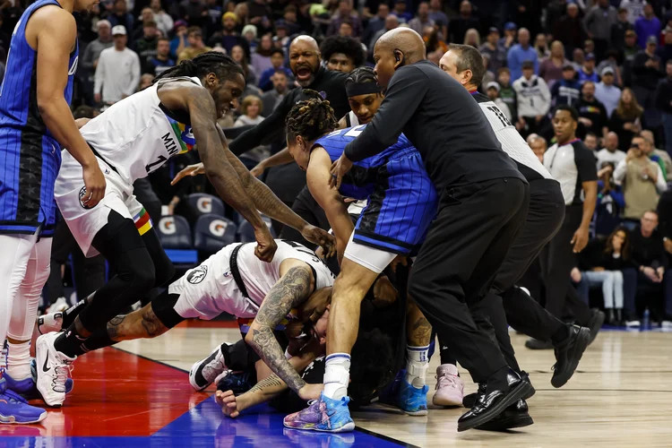 MINNEAPOLIS, MN - FEBRUARY 03: Members of the Orlando Magic and Minnesota Timberwolves get into a scrum in the third quarter of the game at Target Center on February 03, 2023 in Minneapolis, Minnesota. Mo Bamba #11, Jalen Suggs #4 of the Orlando Magic and Austin Rivers #25 of the Minnesota Timberwolves were ejected from the game. NOTE TO USER: User expressly acknowledges and agrees that, by downloading and or using this Photograph, user is consenting to the terms and conditions of the Getty Images License Agreement. (Photo by David Berding/Getty Images) (David Berding/Getty Images)